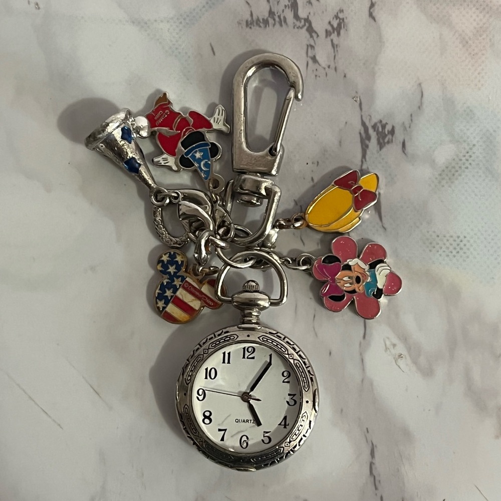 Disney clip on watch with Disney charms(needs new battery)
